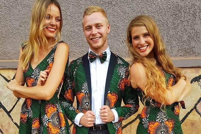 Custom African Wear Consultation - Choosing fabric in Uganda