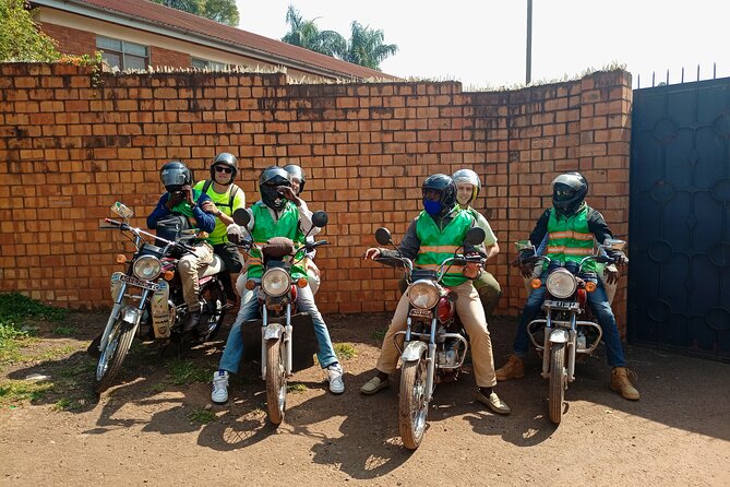 Kampala boda boda tours [motorbike tours]. - Riding through Kalerwe Market